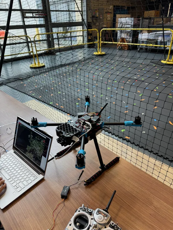 Jul 11: on the kit’s tall landing legs beside the flight cage, with a laptop and the RC transmitter