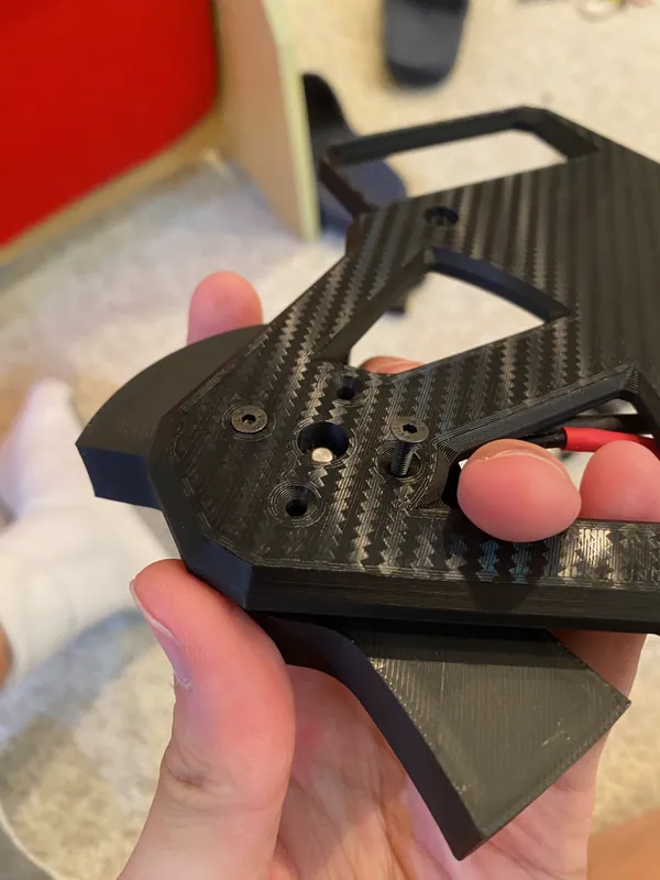 Jul 12: the grey one-tooth blade, its counterweight showing under the plate