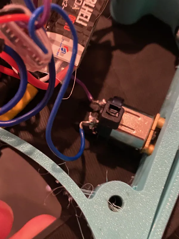 Jul 11: an N20's leads soldered straight onto its back tabs, with the wiring packed around it