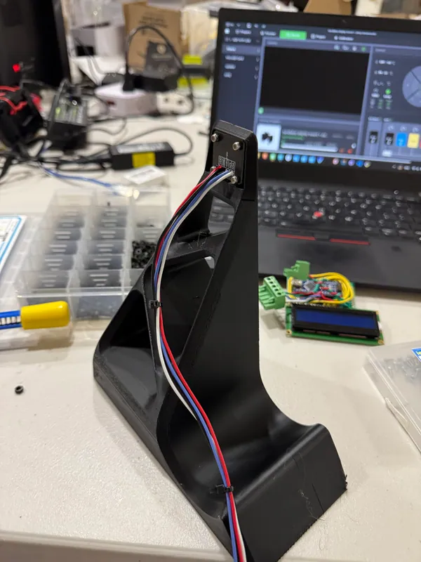 The printed tower, with the wires routed up the back to the sensor