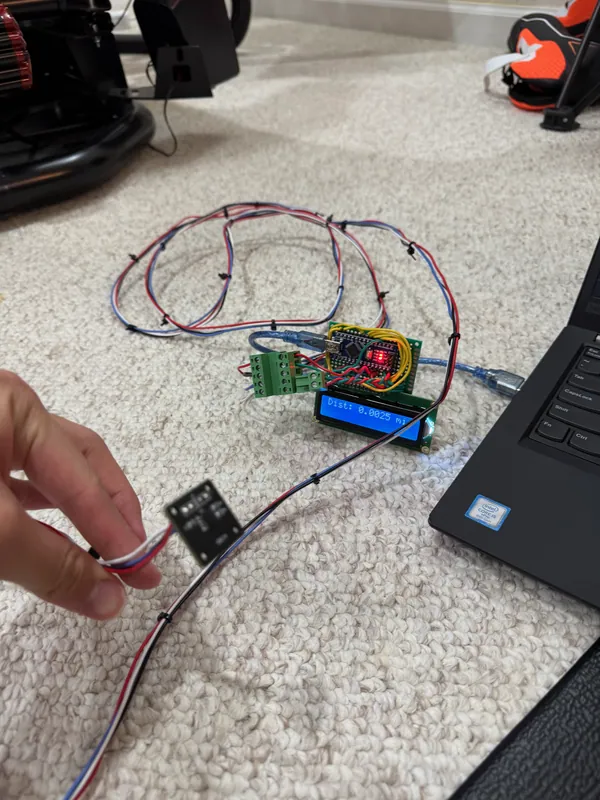 Sensor, Nano and LCD wired together on the floor, before the mounts were printed