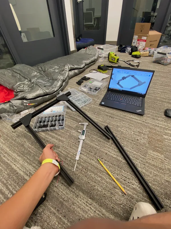 Early Saturday: extrusion, calipers and the frame sketch on the laptop
