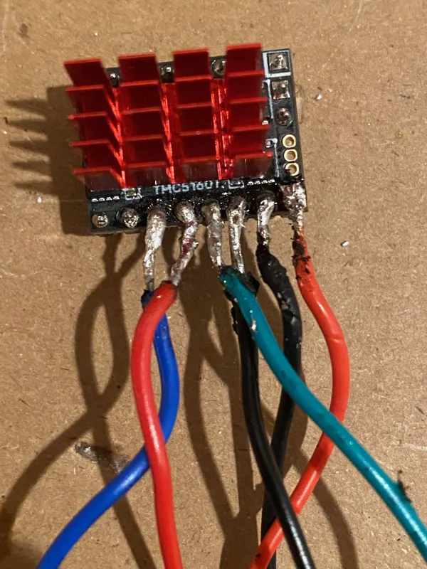 The first drivers, TMC5160s, with power and motor wires soldered straight to the pins (May 2024)