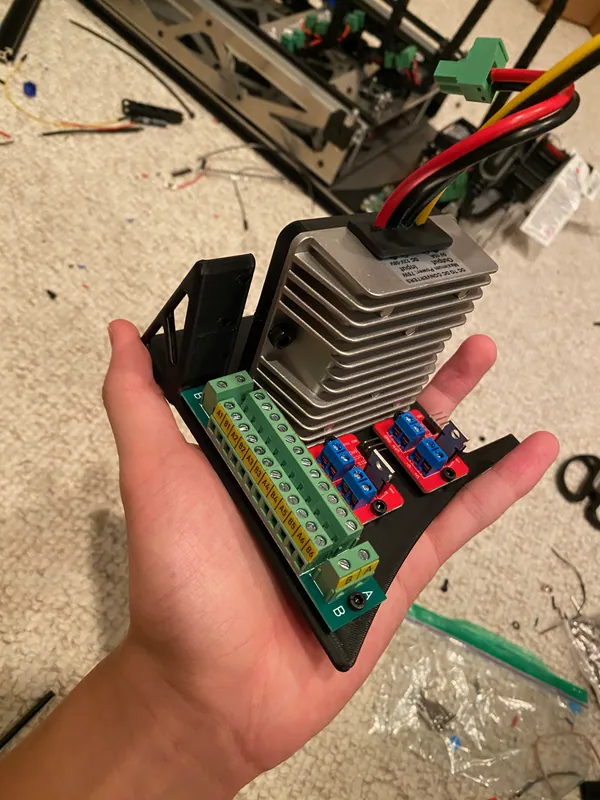 The right bay: buck converter, terminal block and the two MOSFET modules (July 2024)