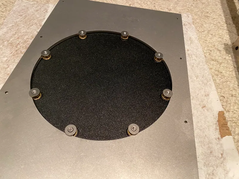 The eight bearing posts around the printed pulley disc (March 2024)