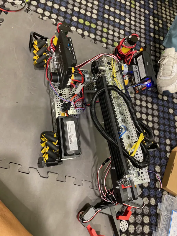 Aug 1: the rebuilt robot from above before the sideplates, with the pivot motors and the slides stowed