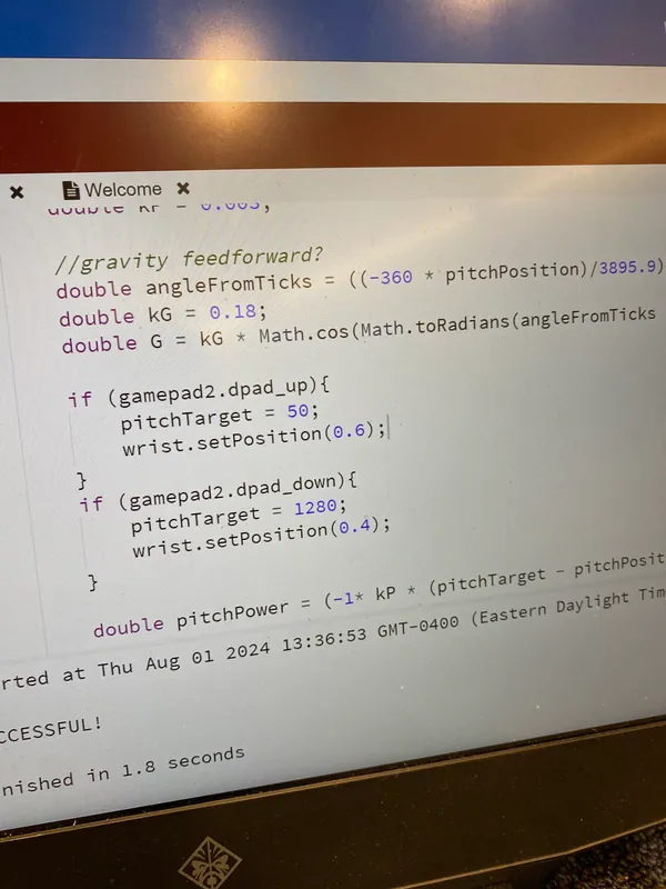 Aug 1, mid-tuning: TestTeleop on my laptop with the gravity feedforward lines. The down preset was still 1,280 ticks here; the final code uses 1,225