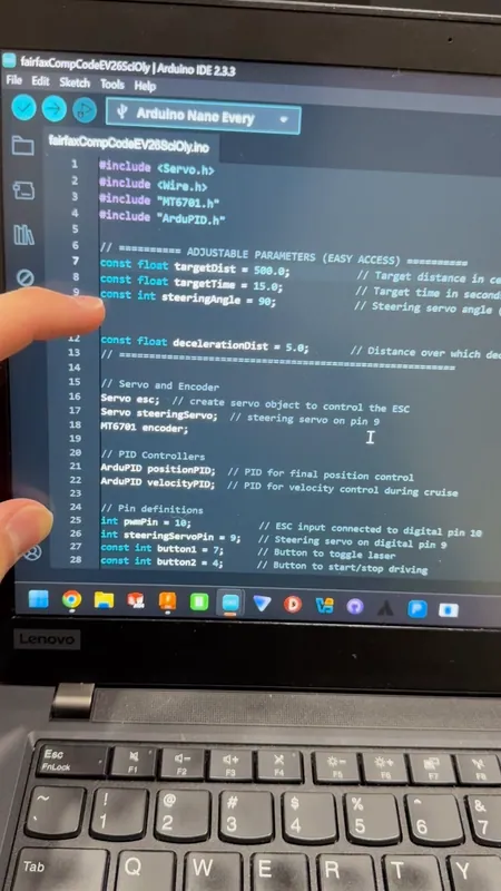 The settings block at the top of the competition code