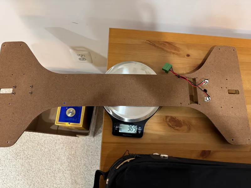 One HDF plate from version one: 369 g