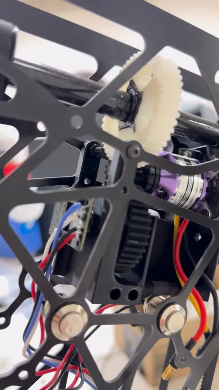 Through the top plate: the gearbox, the 48T gear and the two buttons