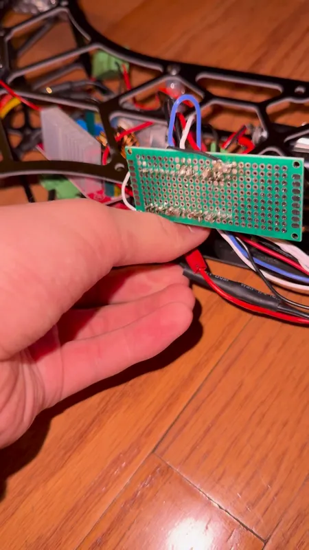The perfboard, wired into the chassis