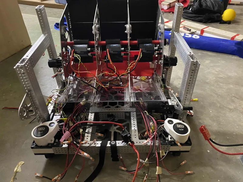 Mar 7: the assembled robot from the back, three lanes with the bent backing and the flex wheels across all three