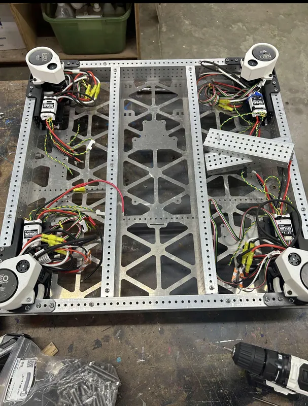 Feb 13: the aluminum frame and the triangle-pocketed belly pan with the modules in