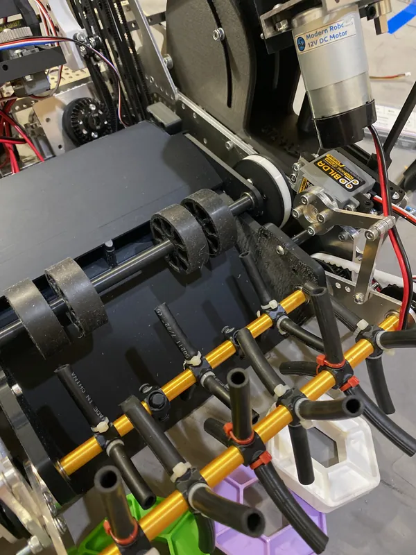 Jan 2, 2024: the built intake, rubber tubing flaps on gold aluminum tubes, held with zip ties