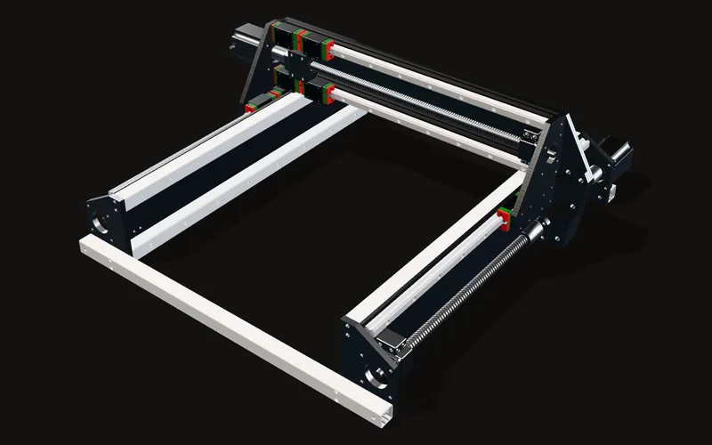 My CAD of the router: the field extrusion frame, the Y rails and ball screws along both sides, and the gantry with the X axis across the back, motors at the rear