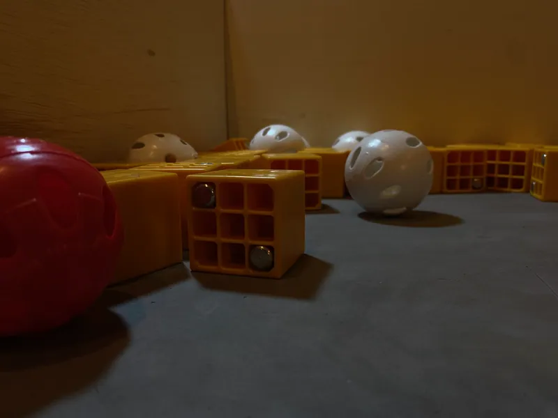 FREIGHT FRENZY freight: boxes, some with metal weights in their cells, and balls