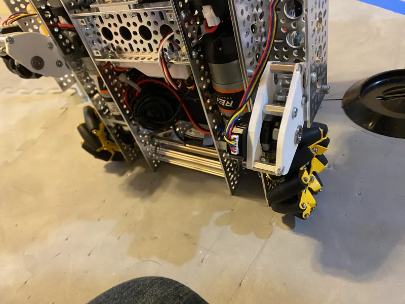 February 3: a corner of the chassis, with aluminum channel, a motor and a mecanum wheel