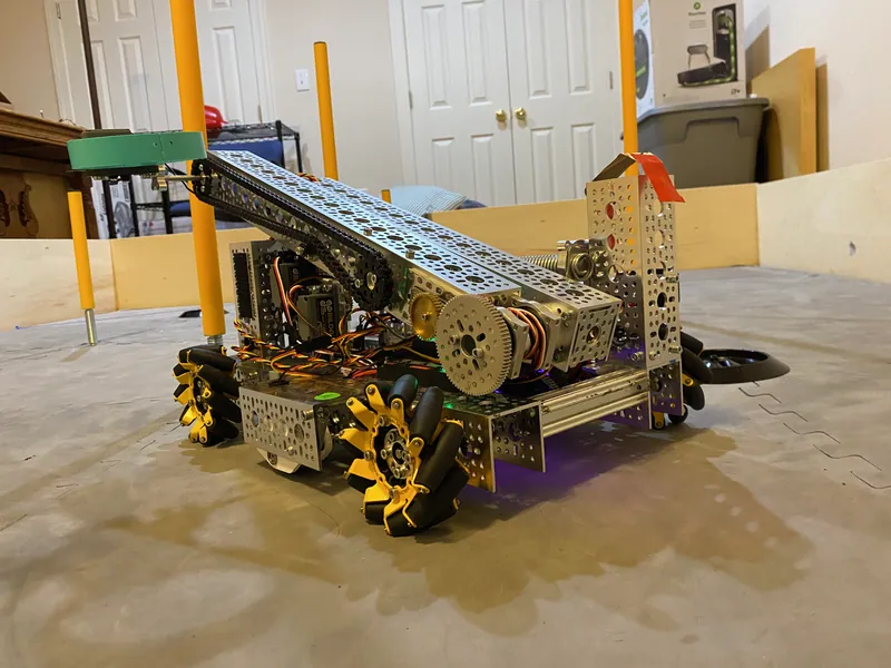 January 25, 2023: the arm folded back over the chassis, with the green C-band claw at one end