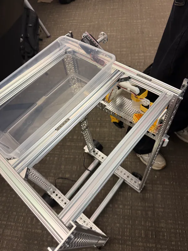 9:44 pm: frame done, clear bin on the top deck, arm on the side