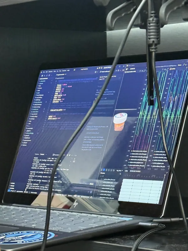 3:20 am: code on the laptop, with a webcam hanging off its cable