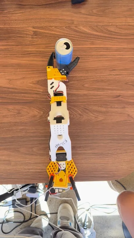 From above: the jaw closes on the can