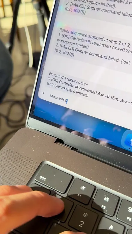 Replies on a laptop: a move that was clamped, then a gripper step that failed and stopped the sequence