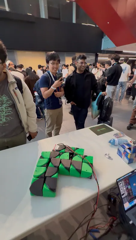 A flat fold on the booth table while visitors film it