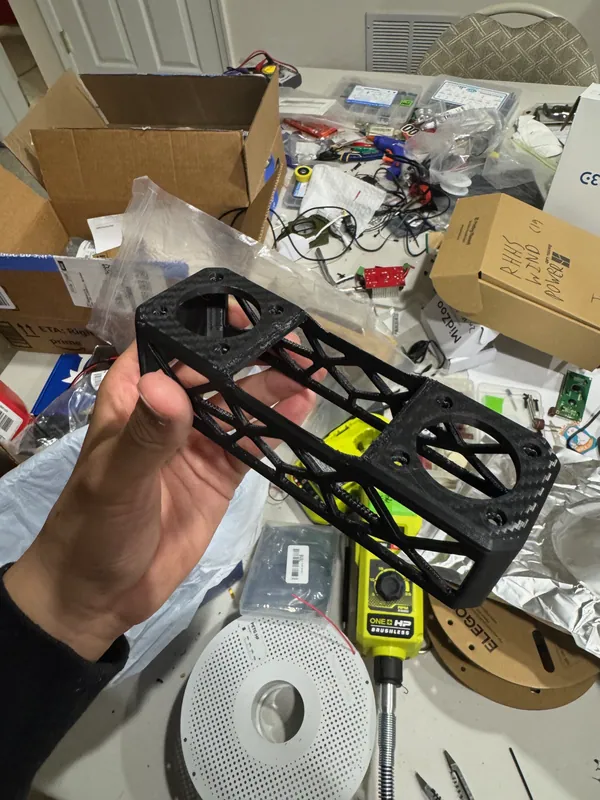 The housing off the printer, with lattice sides