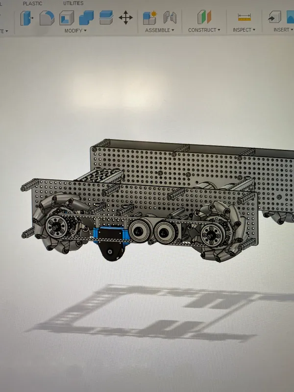 May 7, 2023: the chassis side in CAD, with the mecanum wheels and the odometry pod