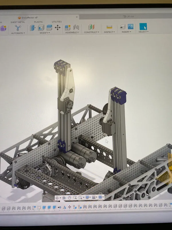 Aug 21, 2023: the whole robot in Fusion 360, two lift towers on the pocketed drivetrain